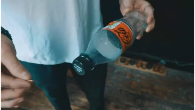 Slo Mo Coin in Bottle by Lloyd Barnes - Money & Coin Tricks Slo Mo Coin in Bottle by Lloyd Barnes - Money & Coin Tricks